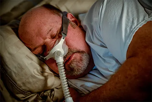 Persona con Apnea del Sueño Persona con Apnea del Sueño